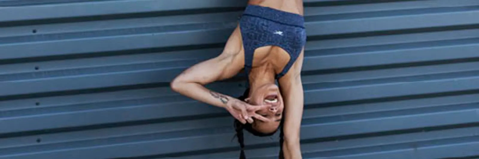 Practice forearm stands with support from the Trapeze
