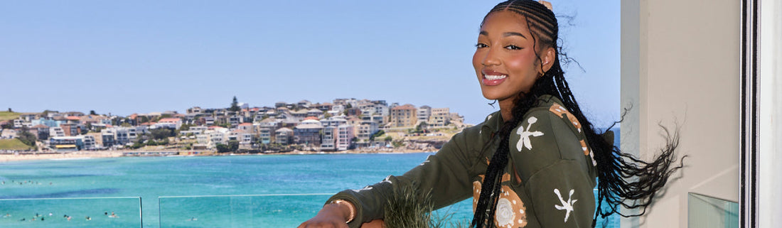 Angel Reese lands down under