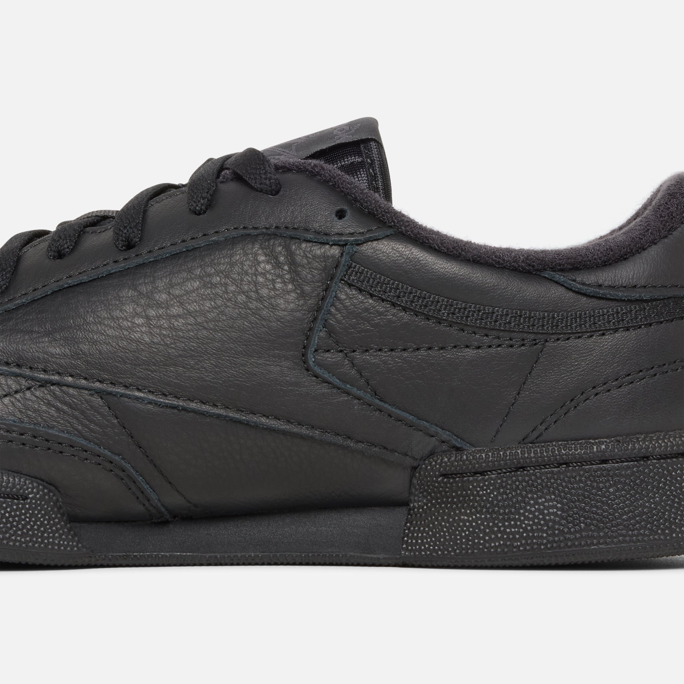 reebok club c leather trainers in black