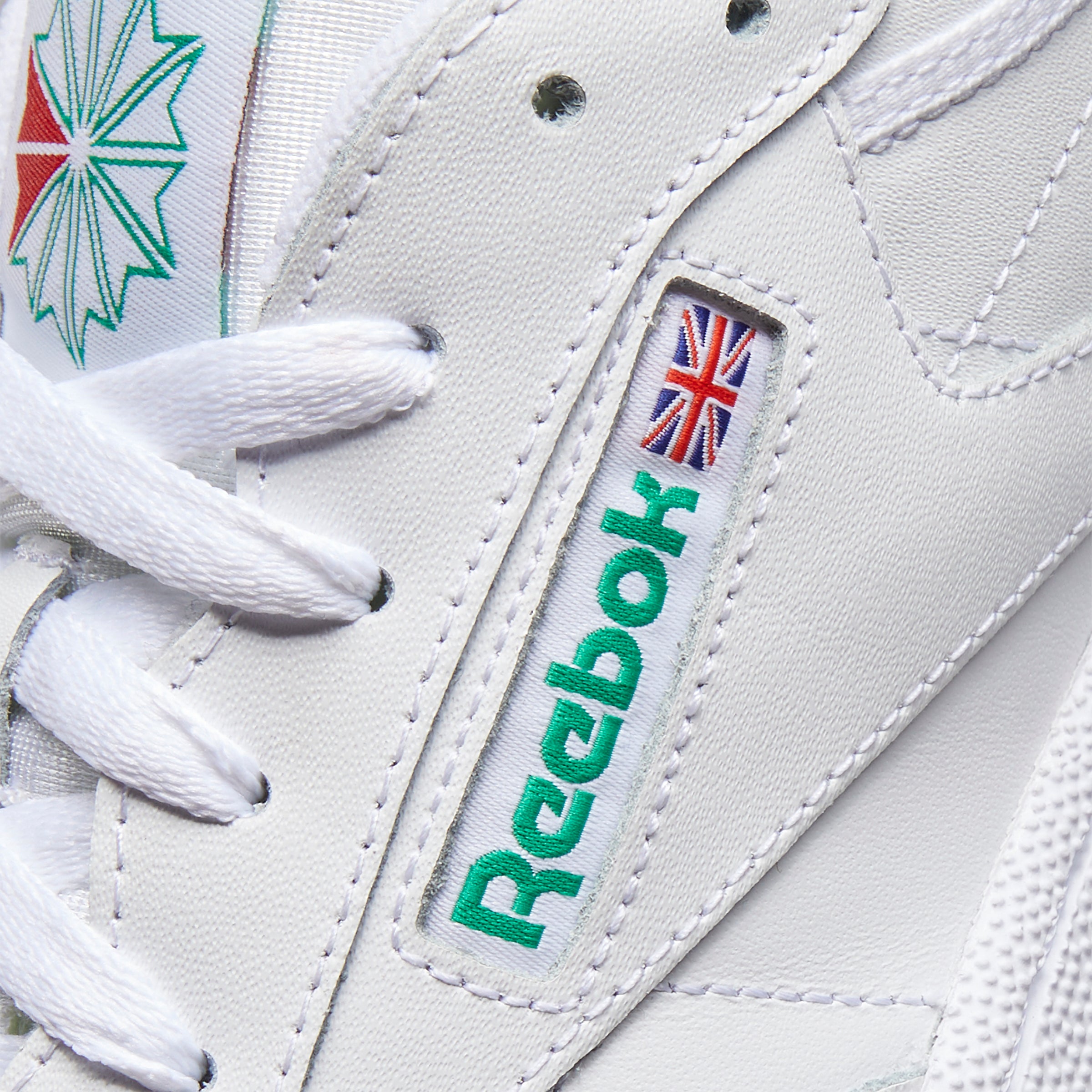 Reebok with green on sale writing