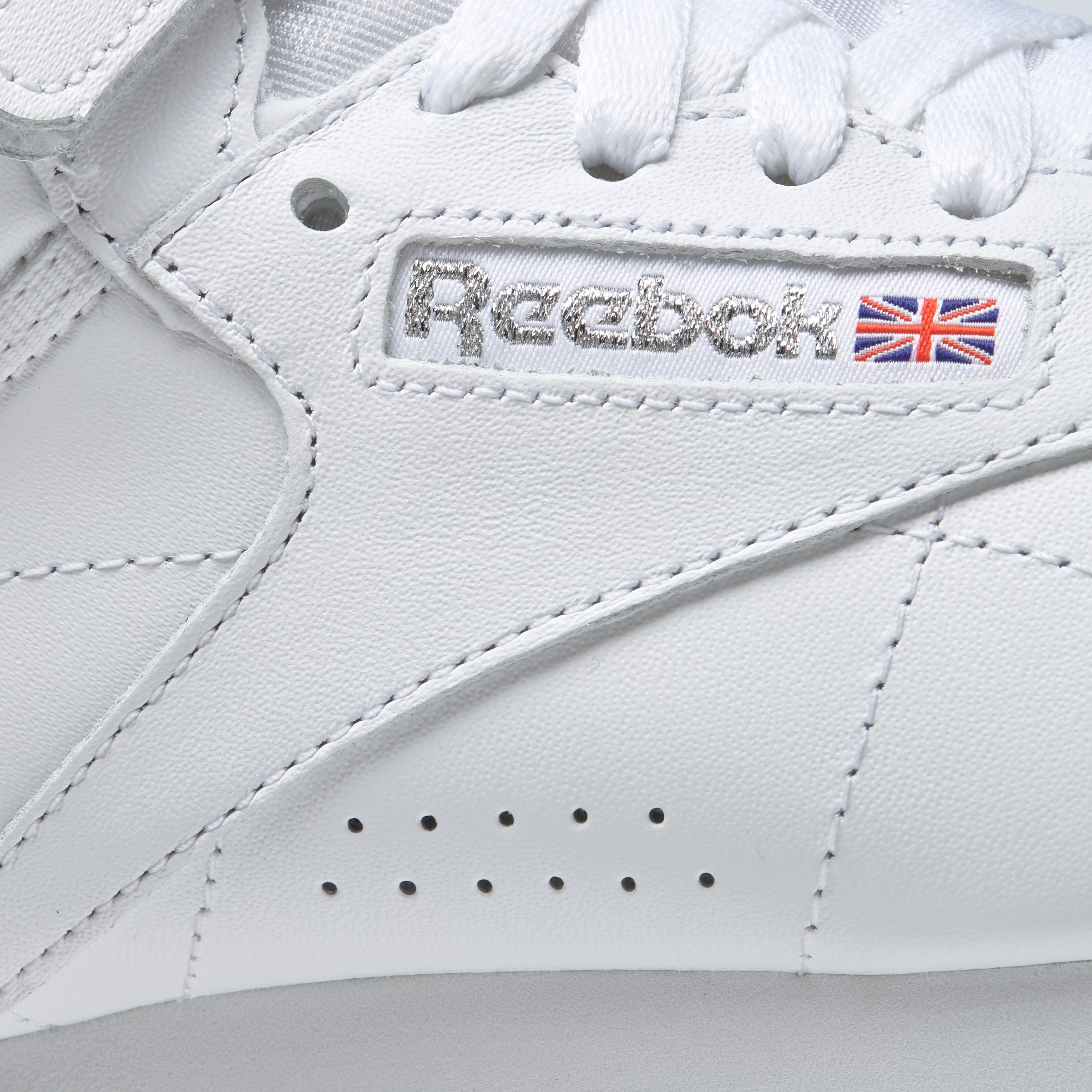 Reebok high tops womens silver on sale