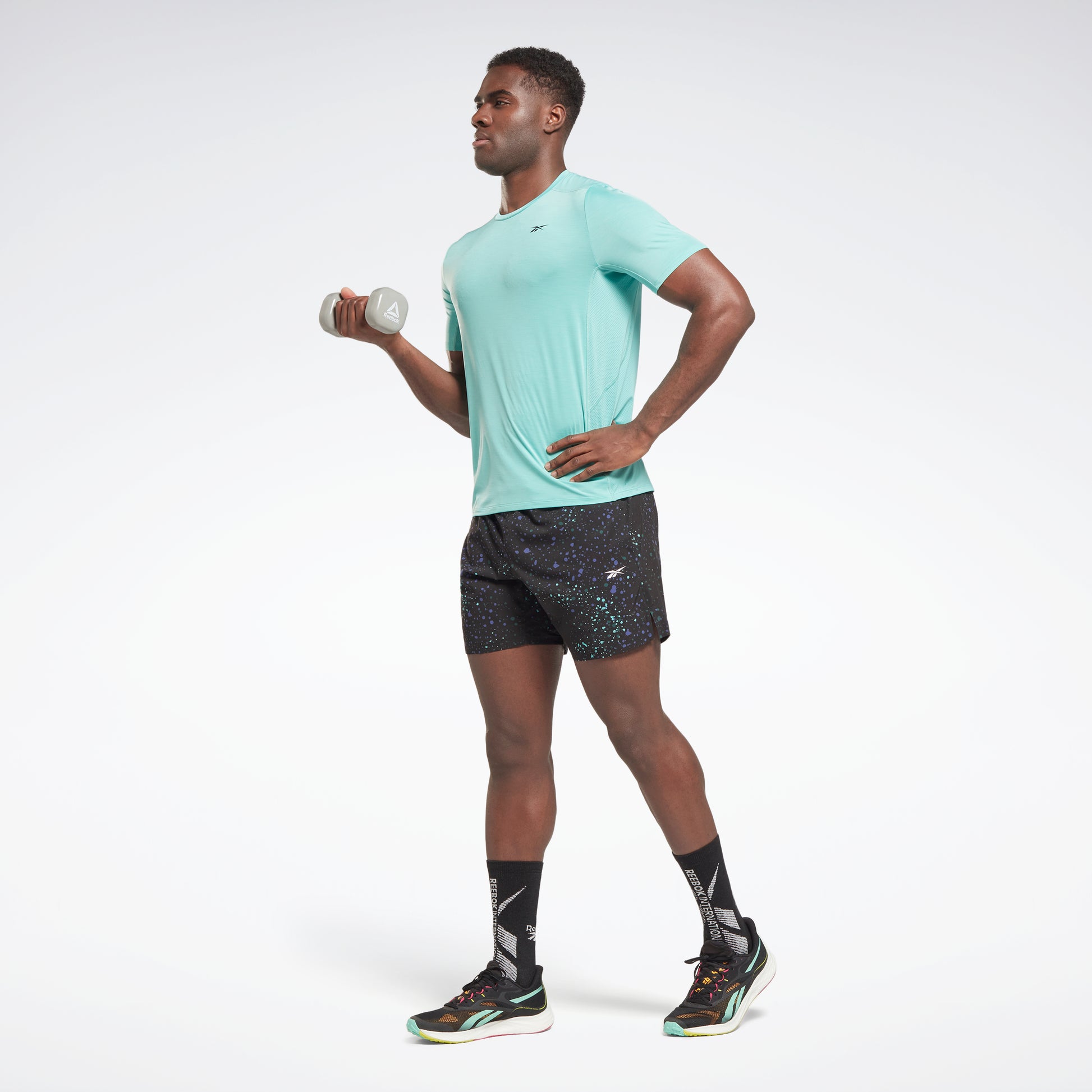 Nike Dri-FIT Men's Allover Print Short-Sleeve Yoga Top.