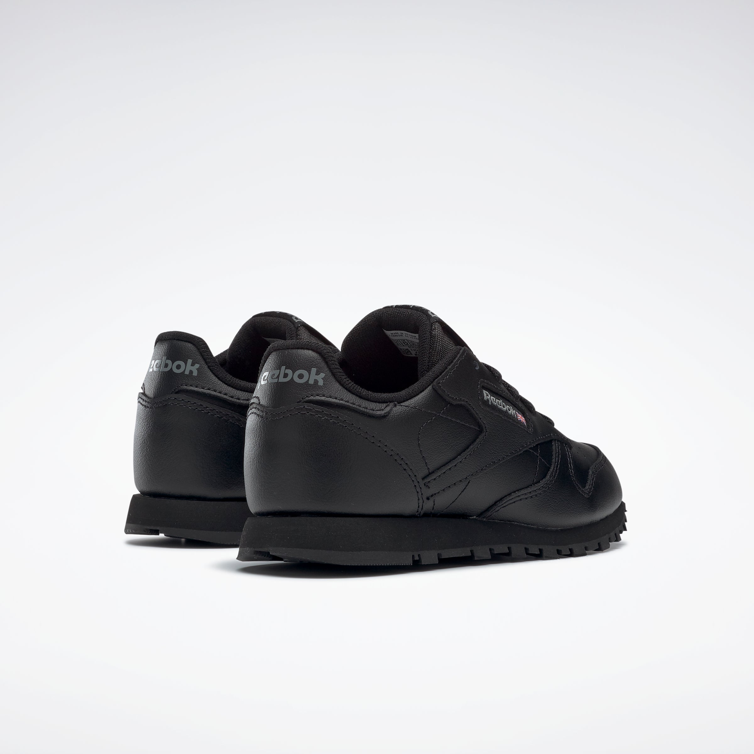 Kids deals black reebok