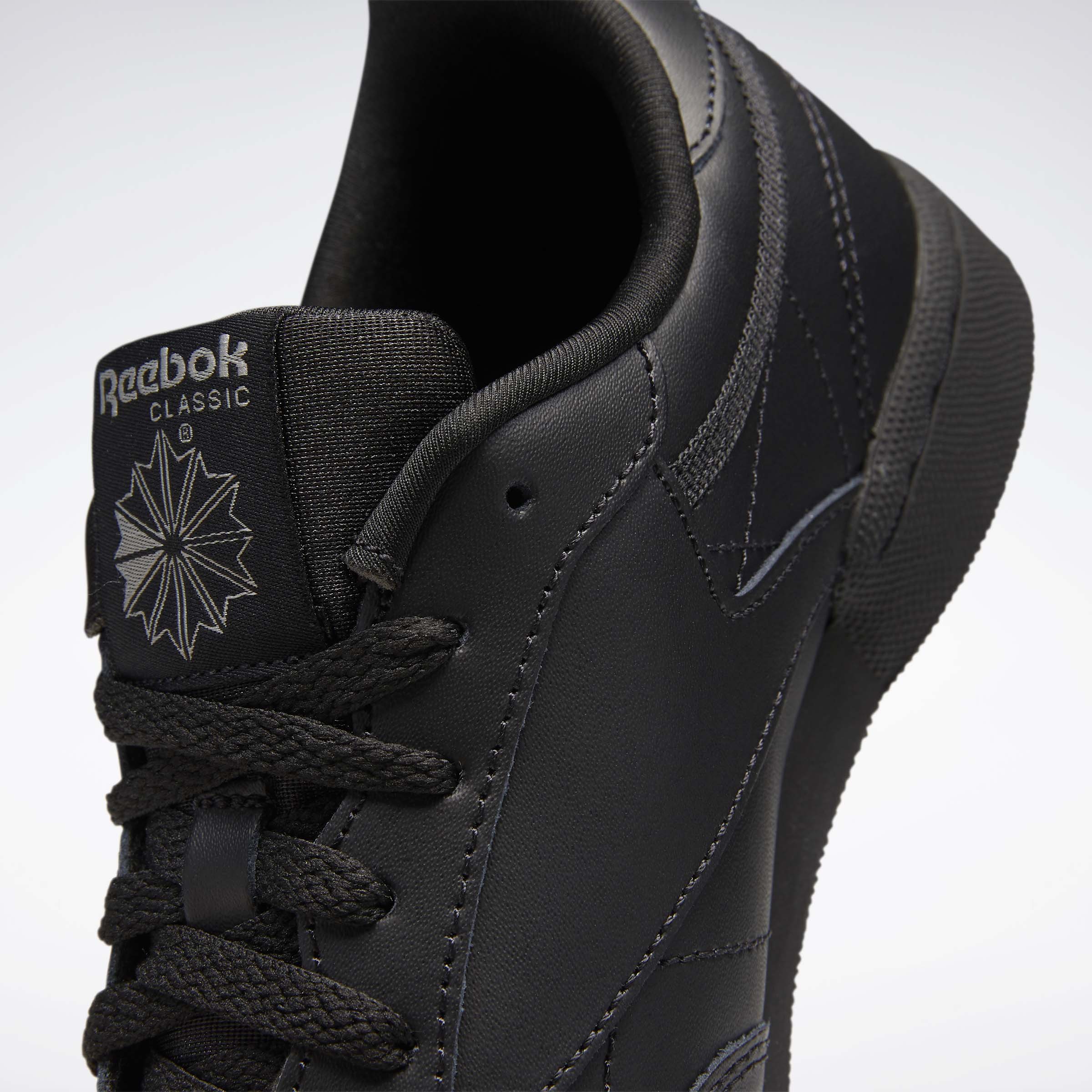 Reebok school shoes store black